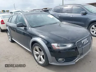 2014 Audi allroad Premium Plus with VIN WA1UFAFL2EA092988, listed as a IAAI auction lot 41879196 with 147,063 mi miles. Bid and sale history available at carsss.com. Image 1.