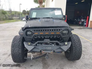 2018 Jeep Wrangler Unlimited Sport S with VIN 1C4HJXDG2JW228483, listed as a IAAI auction lot 41710364 with 56,970 mi miles. Bid and sale history available at carsss.com. Image 12.