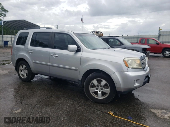 2011 Honda Pilot EX-L with VIN 5FNYF3H71BB033923, listed as a Copart auction lot 56649305 with 132,304 mi miles and Salvage title. Bid and sale history available at DreamBid. Image 4.