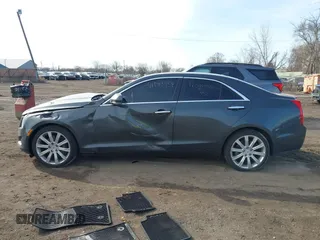 2014 Cadillac ATS Luxury AWD z VIN 1G6AH5RX6E0140302, wystawiony jako IAAI lot #41843454 z przebiegiem 125 388 mil mil oraz . Historia ofert i sprzedaży dostępna na DreamBid. Obrazek 14.