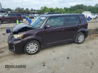 2015 Scion xB z VIN JTLZE4FE7FJ068077, wystawiony jako Copart lot #56874055 z przebiegiem 104 941 mil mil oraz Szkoda całkowita • Salvage title. Historia ofert i sprzedaży dostępna na DreamBid. Obrazek 1.