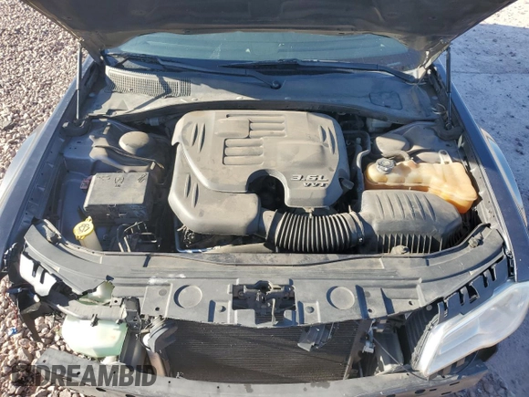 2014 Chrysler 300 z VIN 2C3CCAAG7EH255371, wystawiony jako Copart lot #54427245 z przebiegiem 166 049 mil mil oraz Szkoda całkowita • Salvage title. Historia ofert i sprzedaży dostępna na DreamBid. Obrazek 11.