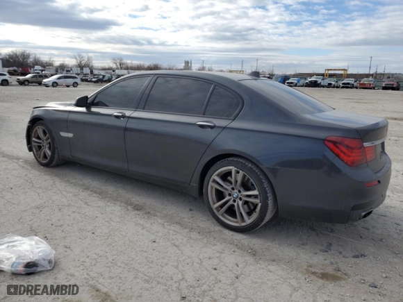 2013 BMW 7 Series 750Li with VIN WBAYE8C55DD133245, listed as a Copart auction lot 84093094 with 132,240 mi miles and Salvage Title. Bid and sale history available at carsss.com. Image 2.