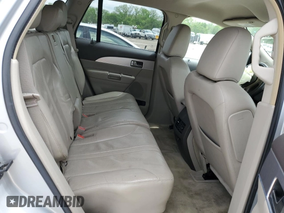 2011 Lincoln MKX z VIN 2LMDJ8JK6BBJ08962, wystawiony jako Copart lot #54329225 z przebiegiem 183 883 mil mil oraz Szkoda całkowita • Salvage title. Historia ofert i sprzedaży dostępna na DreamBid. Obrazek 11.