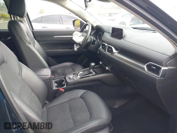 2019 Mazda CX-5 Touring with VIN JM3KFACM5K0697137, listed as a IAAI auction lot 41720253 with 50,416 mi miles. Bid and sale history available at carsss.com. Image 5.