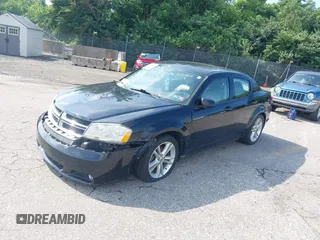2013 Dodge Avenger SXT with VIN 1C3CDZCB7DN650959, listed as a IAAI auction lot 42592881 with 107,652 mi miles and . Bid and sale history available at DreamBid. Image 2.