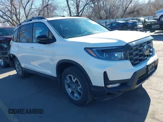 2023 Honda Passport TrailSport with VIN 5FNYF8H60PB015912, listed as a IAAI auction lot 41667749 with 35,019 mi miles and . Bid and sale history available at carsss.com. Image 1.