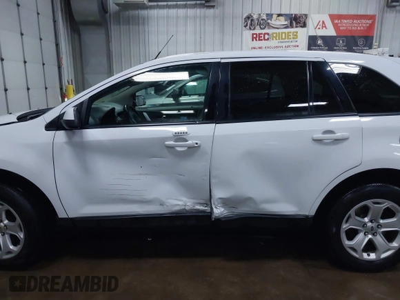 2014 Ford Edge SEL z VIN 2FMDK4JC9EBB06783, wystawiony jako IAAI lot #42047206 z przebiegiem 125 963 mil mil oraz . Historia ofert i sprzedaży dostępna na DreamBid. Obrazek 14.
