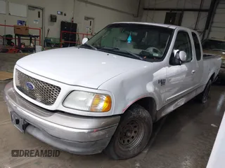 2003 Ford F-150 XL with VIN 1FTRX17W13NB80440, listed as a IAAI auction lot 41460037 with 1 mi miles. Bid and sale history available at carsss.com. Image 2.