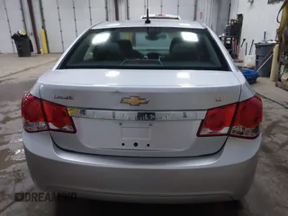 2014 Chevrolet Cruze 2LT z VIN 1G1PE5SB4E7393620, wystawiony jako IAAI lot #42056437 z przebiegiem 173 687 mil mil oraz . Historia ofert i sprzedaży dostępna na DreamBid. Obrazek 16.