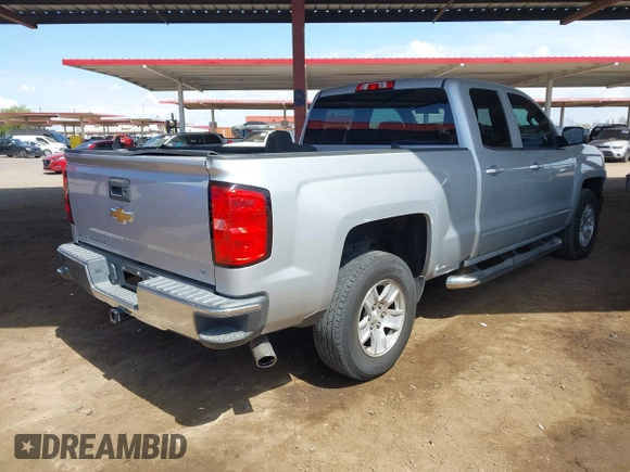 2016 Chevrolet Silverado 1500 LT with VIN 1GCRCREC3GZ185219, listed as a IAAI auction lot 41970474 with 124,101 mi miles and . Bid and sale history available at DreamBid. Image 4.