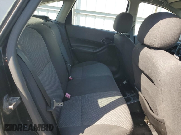 2007 Ford Focus S z VIN 1FAHP37N07W161088, wystawiony jako Copart lot #54140415 z przebiegiem 241 367 mil mil oraz Szkoda całkowita • Salvage title. Historia ofert i sprzedaży dostępna na DreamBid. Obrazek 10.
