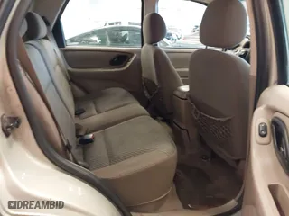 2004 Ford Escape XLT with VIN 1FMYU93164KB05521, listed as a IAAI auction lot 41723219 with 246,369 mi miles. Bid and sale history available at carsss.com. Image 8.