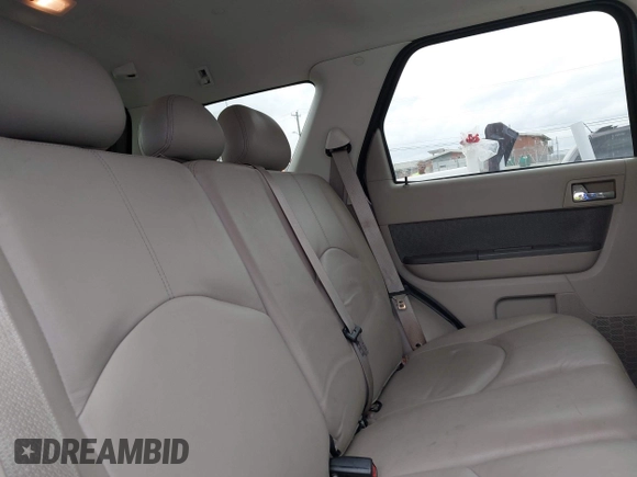 2009 Mercury Mariner Premier z VIN 4M2CU87G19KJ06424, wystawiony jako IAAI lot #41943456 z przebiegiem 178 149 mil mil oraz . Historia ofert i sprzedaży dostępna na DreamBid. Obrazek 8.