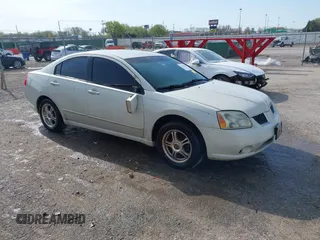 2004 Mitsubishi Galant ES z VIN 4A3AB36F14E132394, wystawiony jako IAAI lot #41946982 z przebiegiem 167 162 mil mil oraz . Historia ofert i sprzedaży dostępna na DreamBid. Obrazek 1.