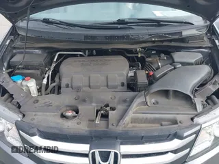 2016 Honda Odyssey EX-L with VIN 5FNRL5H68GB104350, listed as a IAAI auction lot 42023306 with 124,672 mi miles. Bid and sale history available at carsss.com. Image 10.