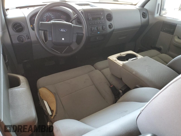 2004 Ford F-150 STX с VIN 1FTRX12W44NA47003, выставлен на аукционе Copart как лот 61133075 с пробегом 258 417 миль миль и Списание • Salvage title. История ставок и продаж доступна на DreamBid. Изображение 8.