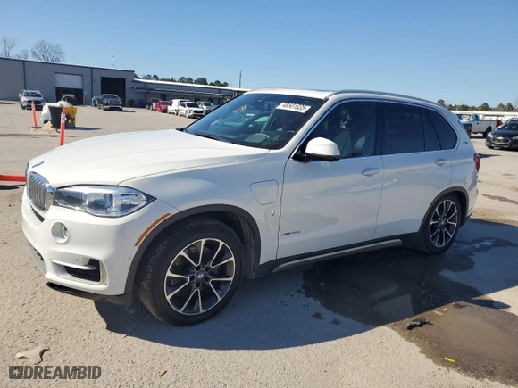 2018 BMW X5 xDrive40e iPerformance with VIN 5UXKT0C52J0W00851, listed as a Copart auction lot 48501035 with 100,112 mi miles and Clean Title. Bid and sale history available at carsss.com. Image 1.