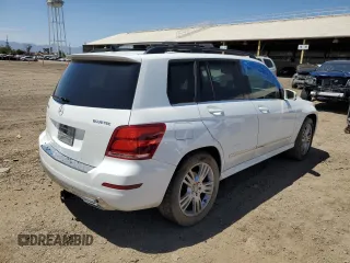 2015 Mercedes-Benz GLK 250 with VIN WDCGG0EB2FG402004, listed as a Copart auction lot 63126493 with 130,821 mi miles and . Bid and sale history available at DreamBid. Image 3.