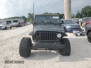 2002 Jeep Wrangler Sahara with VIN 1J4FA59S02P729015, listed as a Copart auction lot 63525745 with Not provided miles and Clean title. Bid and sale history available at DreamBid. Image 5.