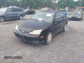 2007 Ford Focus S with VIN 1FAHP34N77W281443, listed as a IAAI auction lot 42693290 with 164,336 mi miles and . Bid and sale history available at DreamBid. Image 2.