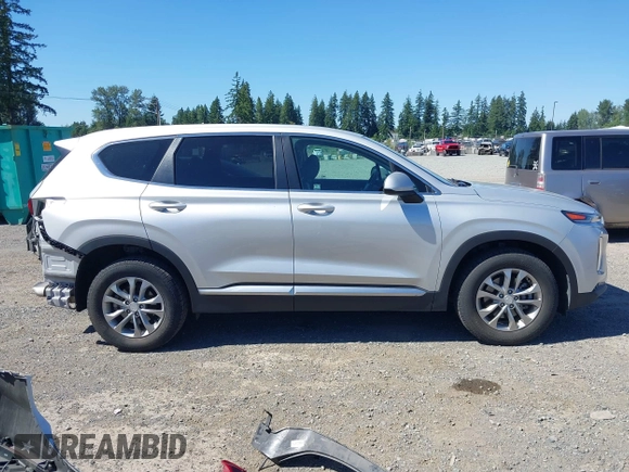 2019 Hyundai Santa Fe SE with VIN 5NMS2CAD9KH122140, listed as a IAAI auction lot 42616171 with 50,794 mi miles and . Bid and sale history available at DreamBid. Image 14.