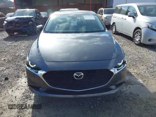 2023 Mazda 3 S Premium with VIN 3MZBPBDM8PM373434, listed as a IAAI auction lot 41234729 with 9,387 mi miles and . Bid and sale history available at DreamBid. Image 12.