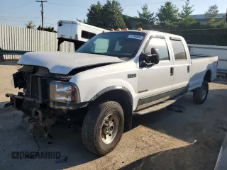 2000 Ford F-350 XL with VIN 1FTSW31F7YED79895, listed as a Copart auction lot 71744804 with 176,241 mi miles and Salvage Title. Bid and sale history available at DreamBid. Image 1.
