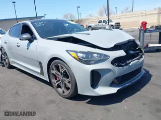 2018 Kia Stinger GT1 with VIN KNAE45LC7J6034168, listed as a IAAI auction lot 41979658 with 111,854 mi miles. Bid and sale history available at carsss.com. Image 1.