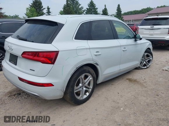 2019 Audi Q5 Premium with VIN WA1ANAFY1K2112834, listed as a IAAI auction lot 42443822 with 98,579 mi miles and . Bid and sale history available at DreamBid. Image 4.