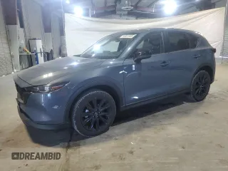 2023 Mazda CX-5 S Carbon Edition z VIN JM3KFBCM2P0245420, wystawiony jako Copart lot #54561985 z przebiegiem 15 482 mil mil oraz Szkody całkowita. Historia ofert i sprzedaży dostępna na DreamBid. Obrazek 1.