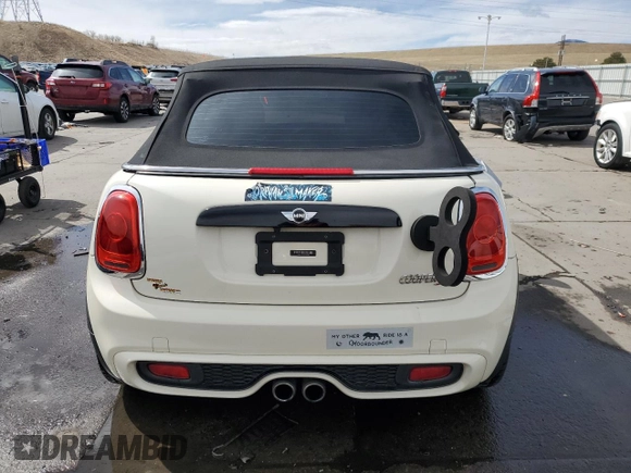 2016 MINI Convertible S с VIN WMWWG9C54G3C21935, выставлен на аукционе Copart как лот 49302455 с пробегом 63 579 миль миль и Списание • Salvage title. История ставок и продаж доступна на DreamBid. Изображение 6.