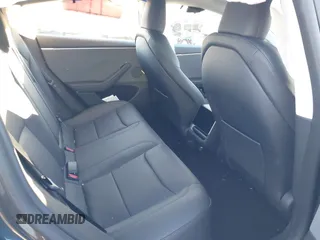 2024 Tesla Model 3 with VIN 5YJ3E1EA7RF853483, listed as a IAAI auction lot 40863575 with 1,173 mi miles and . Bid and sale history available at carsss.com. Image 8.