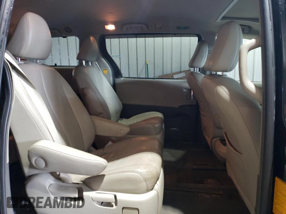 2012 Toyota Sienna XLE with VIN 5TDDK3DC9CS047319, listed as a Copart auction lot 53173405 with 198,654 mi miles and Salvage Title. Bid and sale history available at carsss.com. Image 11.