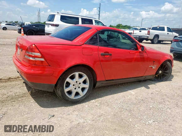 2000 Mercedes-Benz SLK 230 Kompressor with VIN WDBKK47F2YF156715, listed as a Copart auction lot 63873805 with 140,706 mi miles and Salvage title. Bid and sale history available at DreamBid. Image 3.