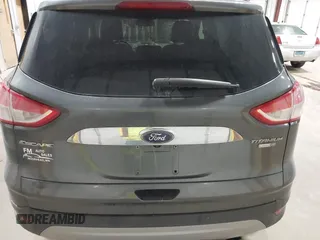 2016 Ford Escape Titanium with VIN 1FMCU9J93GUC39933, listed as a IAAI auction lot 42616323 with 116,482 mi miles and . Bid and sale history available at DreamBid. Image 16.