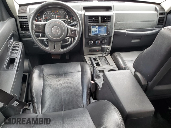 2011 Jeep Liberty Sport Jet with VIN 1J4PP2GK6BW569734, listed as a Copart auction lot 58393705 with 67,489 mi miles and Salvage title. Bid and sale history available at DreamBid. Image 8.