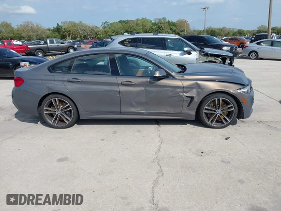 2018 BMW 4 Series 440i with VIN WBA4J5C54JBF07315, listed as a IAAI auction lot 41738540 with 74,577 mi miles and . Bid and sale history available at DreamBid. Image 13.