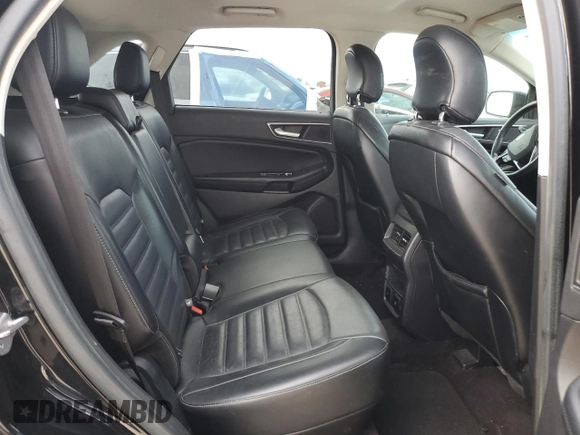 2016 Ford Edge SEL z VIN 2FMPK3J94GBC11035, wystawiony jako Copart lot #53708355 z przebiegiem 101 416 mil mil oraz Czysty tytuł • Clean title. Historia ofert i sprzedaży dostępna na DreamBid. Obrazek 11.
