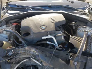 2013 BMW 5 Series 528i with VIN WBAXG5C59DDY32432, listed as a IAAI auction lot 41230673 with 103,069 mi miles and . Bid and sale history available at carsss.com. Image 10.