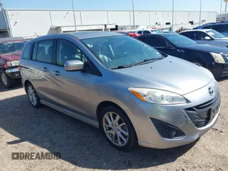 2012 Mazda Mazda5 Grand Touring with VIN JM1CW2DL2C0129518, listed as a IAAI auction lot 41872136 with 129,323 mi miles. Bid and sale history available at carsss.com. Image 1.