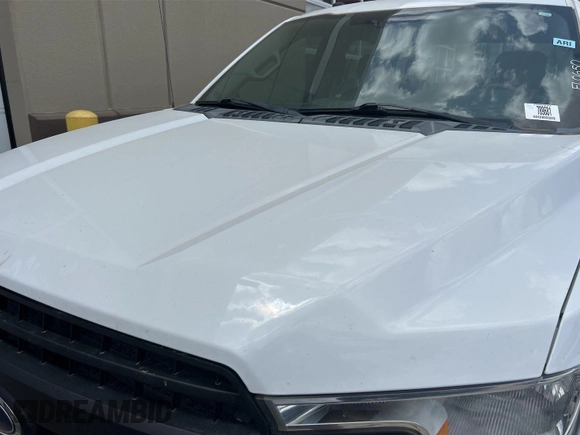 2018 Ford F-150 XL with VIN 1FTFW1E55JKE25772, listed as a IAAI auction lot 42882671 with 132,909 mi miles and . Bid and sale history available at DreamBid. Image 2.