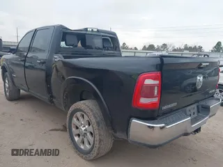 2020 Ram 2500 Laramie z VIN 3C6UR5FL6LG284652, wystawiony jako IAAI lot #41536970 z przebiegiem 92 566 mil mil oraz . Historia ofert i sprzedaży dostępna na DreamBid. Obrazek 3.
