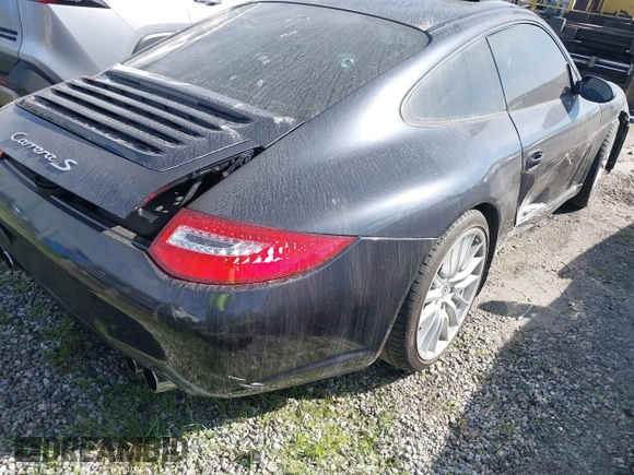 2006 Porsche 911 Carrera S with VIN WP0AB29986S740565, listed as a IAAI auction lot 41488077 with 81,471 mi miles. Bid and sale history available at carsss.com. Image 4.