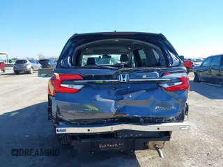2024 Honda Odyssey EX-L with VIN 5FNRL6H63RB037259, listed as a IAAI auction lot 41665850 with 2,710 mi miles and . Bid and sale history available at DreamBid. Image 6.