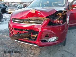 2015 Ford Escape Titanium with VIN 1FMCU9J99FUB34831, listed as a IAAI auction lot 41278305 with 59,658 mi miles and . Bid and sale history available at DreamBid. Image 6.