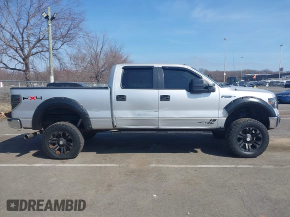 2014 Ford F-150 with VIN 1FTVW1EFXEKD65059, listed as a IAAI auction lot 41791605 with 146,190 mi miles and . Bid and sale history available at DreamBid. Image 13.
