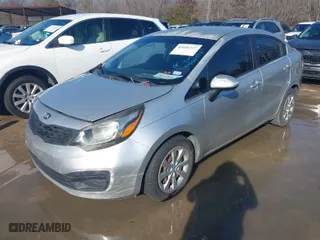 2013 Kia Rio LX with VIN KNADM4A30D6153516, listed as a IAAI auction lot 41646357 with 127,435 mi miles. Bid and sale history available at carsss.com. Image 2.