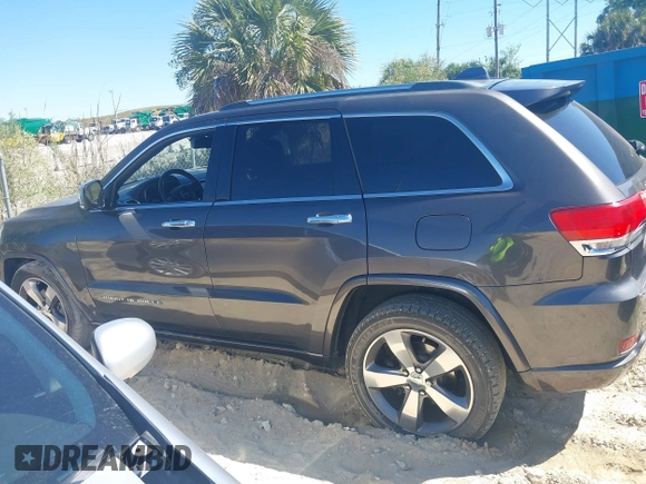 2014 Jeep Grand Cherokee Overland with VIN 1C4RJECG8EC409976, listed as a IAAI auction lot 41821685 with 186,105 mi miles. Bid and sale history available at carsss.com. Image 14.