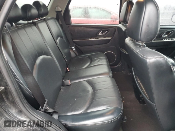 2006 Mercury Mariner Luxury с VIN 4M2CU57146KJ15124, выставлен на аукционе Copart как лот 84397234 с пробегом 232 920 миль миль и Списание • Salvage title. История ставок и продаж доступна на DreamBid. Изображение 11.